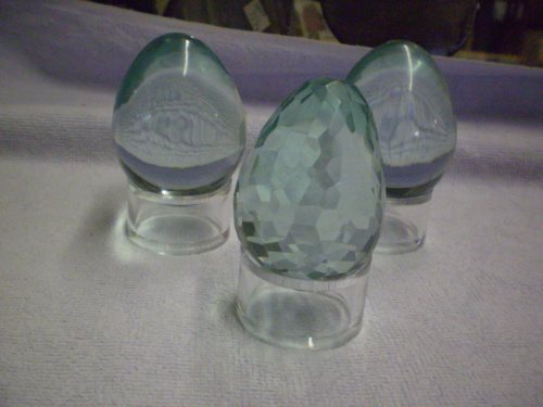 Eggs of slightly green glass, approximately 2 inch